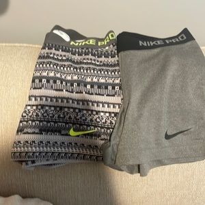Two pairs of Nike Pro shorts